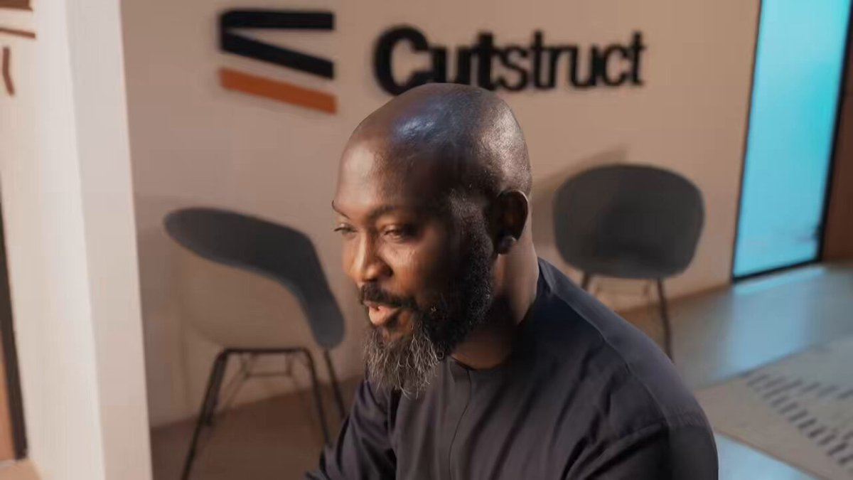 John Oamen in conversation at the Cutstruct office